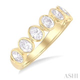1 1/2 Ctw 7-Stone Bezel Set Oval Cut Diamond Fashion Band in 14K Yellow Gold