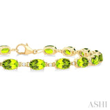 6X4 MM Oval Cut Peridot and 1/6 ctw Round Cut Diamond Semi Precious Tennis Bracelet in 10K Yellow Gold