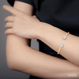 5/8 ctw Oval Shape Lovebright Open Cuff Diamond Bangle in 14K Yellow and White Gold