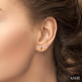 5x3 MM Oval Shape Citrine and 1/8 Ctw Single Cut Diamond Halo Semi-Precious Stud Earrings in 10K White Gold