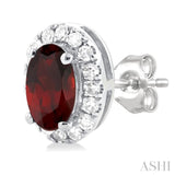 5x3 MM Oval Shape Garnet and 1/8 Ctw Single Cut Diamond Halo Semi-Precious Stud Earrings in 10K White Gold
